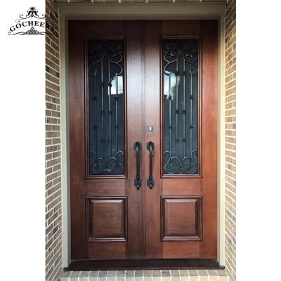 China Modern Iron Wood Exterior Doors Waterproof Main Door Wood Design Wrought Iron Wood Entry Door for sale