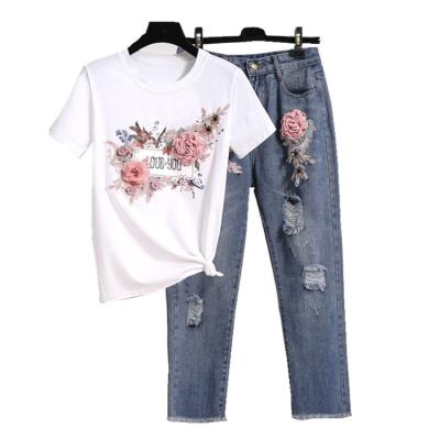 China Anti-pilling 3D Flower Cotton T-shirt s+Mid Sequined Beaded Calf Jean Pant Ladies Suits 2 PCS Sets Jean Suits for sale