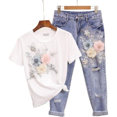 China Anti-pilling New Summer 2 Pieces Set Women Heavy Duty Embroidery 3D Flower T-shirts + Hole Jeans 2pcs Clothes Sets Suits Casual Outfits for sale