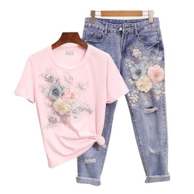 China Anti-pilling Summer fashion ladies embroidered three-dimensional flower short-sleeved T-shirt suit + Nine-hundred hole jeans for sale