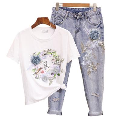 China Anti-pilling women's 2021 summer fashion suit embroidered flower, bird and flower stereo short-sleeved T-shirt + Nine-hundred hole-punched jeans for sale