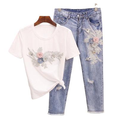 China Anti-pilling new women's suit fashion 2-piece suit autumn and winter heavy industry sequin cartoon rabbit sweater + elastic thin jeans for sale