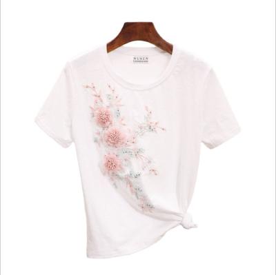 China Anti-wrinkle summer new women's T-shirt heavy industry heavy industry nail pearl embroidery flower three-dimensional short sleeve white top for sale