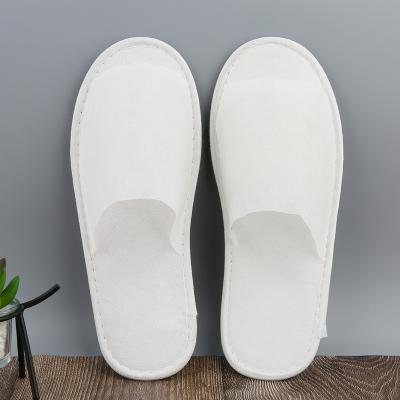 China Eco Comfortable Custom Wholesale Portable Cheap Guest Room Travel Hotel Disposable Lightweight White Slippers for sale