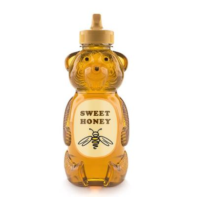 China American Food Grade 12 Ounce 24 Ounce Pure Raw Honey Bear Bottles With Tip PET Squeeze Top Caps for sale