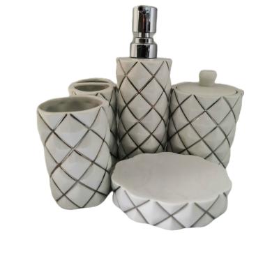 China Fashion Sustainable High Quality Style Ceramic 5 Pcs Bathroom Sets White Striped Toiletries Set Soap Dispenser for sale