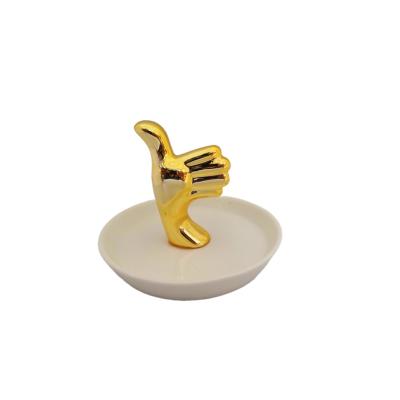 China Creative Ring Display Stand Gold Color Hand Shape Necklace Holder Low Price Durable Good Quality for sale