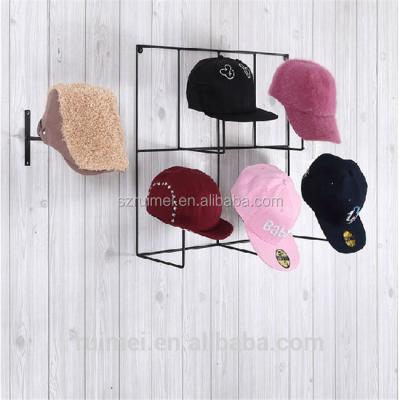 China Rotating Wall Mounted Metal Hat Rack for sale