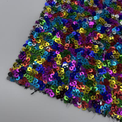 China Glitzy Sequins Embroidery Design 95% polyester 5% Spandex Colorful Sequin Fabric For Vest for sale