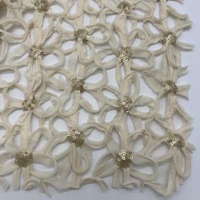 China Sequin Flowers Pattern In Gold Colors Plain Embroidery Fabric For Girl Daily Dresses for sale