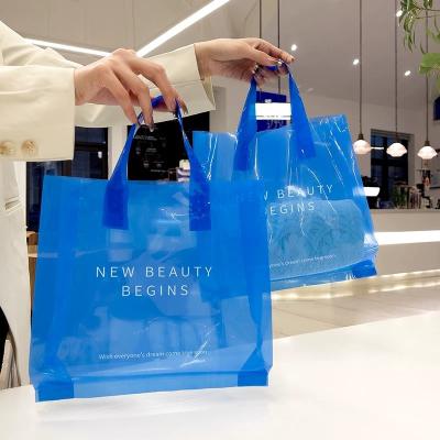 China Blue Shop Logo Boutique Gifts Customized BIODEGRADABLE Packaging Reusable Die Cut Clear Plastic Shopping Bag Handle Bag Carry Bag for sale