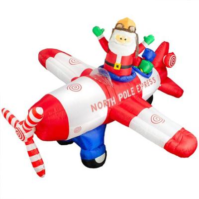 China Giant Inflatable Santa Claus Plane Large Christmas Inflatables for sale