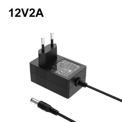 China Electrical Appliances Ce Certificated 12 Volt 2 Amp 24v 1a Power Adapter 24w Wall Mount AC DC Power Supply for sale