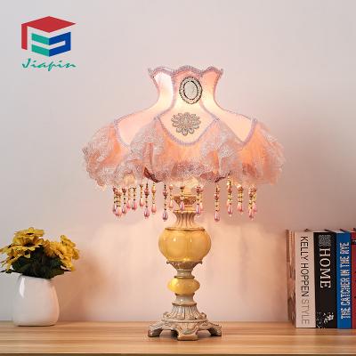 China Handwork classic polyresin table lamp study living room bedroom bedside embroidery handmade lamps for sale