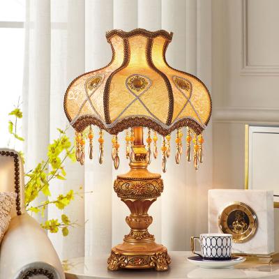 China Modern Home Decorate Bedside Peacock Shade Modern Luxury Resin Table Lamps Reading Lights For Bedroom for sale