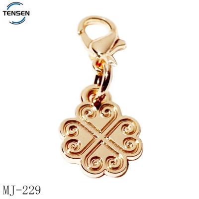 China Environmental Friendly Custom Decorative Lace Gold Charms Making Zinc Alloy Key Rings Metal Hang Tags Accessories For Wristband for sale