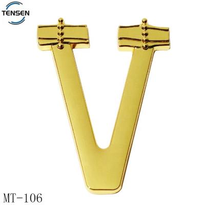 China Nickel Free/Lead Free Swimwear Gold Buckle Custom Zinc Alloy Material Embossed Letter V Brand Metal Logos For Clothes for sale