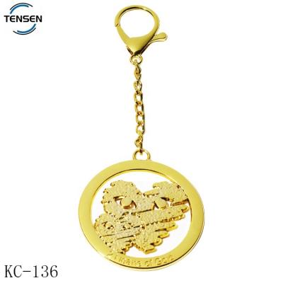 China Environmental Friendly Custom Bags Metal Accessory Gold Charms Round Shape Hollowing Out Logo Private Hang Tags For Wallet for sale