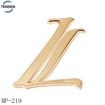 China Environmental Friendly Zinc Alloy Embossed Letter Brand Label Material Custom Design Metal Gold Plated Name Screw Plate For Hats for sale