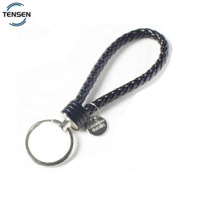 China Wholesale Environmental Friendly Blank Key Holder Handmade Leather Logo Decoration Wristband Charms Car Key Chain Rings For Bags for sale