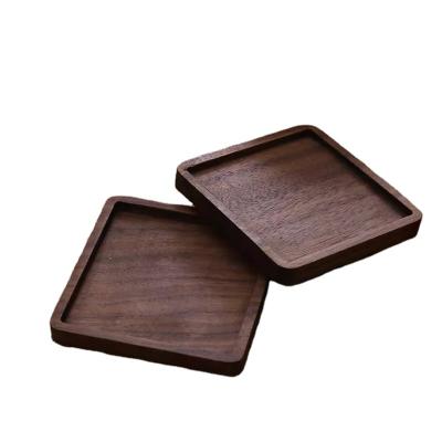 China Sustainable Creative solid wood coasters heat insulation cushion round square tea ceremony coasters for sale