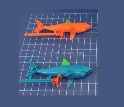 China Capsule Toys Wholesale Soft Kids Toys With Mini Candy Spinner Candy Shark Toys Candy Shark Gun for sale