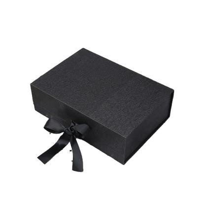 China Recyclable Bespoke Eco Friendly Cardboard Box T Shirt Pants Packaging Boxes Folding Gift Box With Ribbon Closure for sale