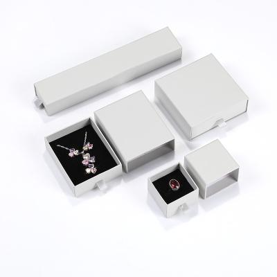 China Newest Custom Paper Drawer Box Ring Bracelet Earring Necklace Jewelry Gift Packing Box With Logo for sale