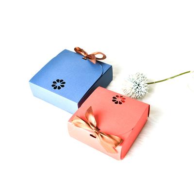 China Factory price disposable custom premium red card blue paper box for candle package with ribbon bow for sale