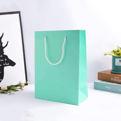 China Wholesale Cheap Price Recycled Gift Boxes Making Materials Cardboard Custom Shopping Paper Packaging Bag for sale