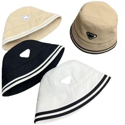 China Bulk New Style Sunshade Brands Women Famous Luxury Bucket Hat Men All Match Unisex Bucket Hat Manufacturer nc designer hats for sale