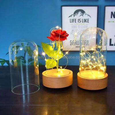 China 2022 New Arrival Rotating LED Night Light with Eternal Red Rose Flower in Glass Dome Rotating Music Wedding Valentine Christmas Decor aa for sale