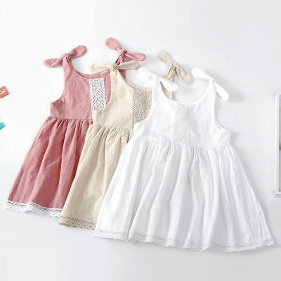 China 2022 Soft Baby Washable Child Cotton Dress Toddler Kids Lace Up Strap Bow Casual Dresses for sale