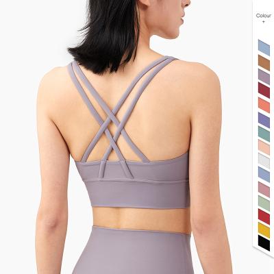 China New Breathable 26 Colors Antibacterial Nylon And Spandex Cross Sports Bra Womens Outdoor Sportswear for sale