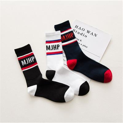 China Good Quality QUICK DRY Good Quality Logo Print Men's Sport Custom Happy Stripe Designer Socks Cotton Stripe Colorful Socks for sale