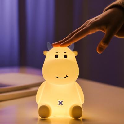 China Modern Cartoon Cow Left Hand Small Night Light Atmosphere Led Rechargeable Light Creative Care Of The Head Of A Bed Sleep With Light for sale