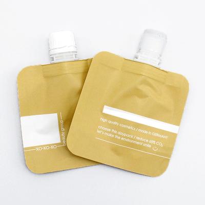 China Custom BIODEGRADABLE Skin Care Liquid Holder Up Pouch Cosmetic Eco Friendly Refill Bag Biodegradable Spout Kraft Paper for sale