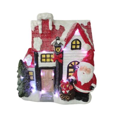 China Other Christmas Poly Resin Christmas House Decorated House With Led Light And Music for sale