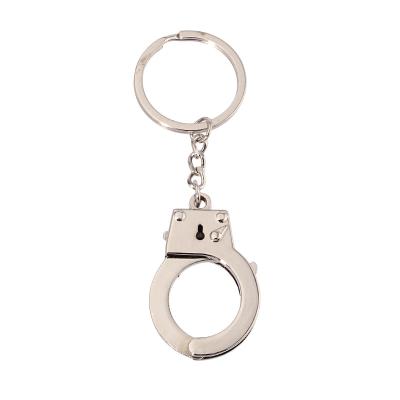 China Mini Handcuffs Keychain Toy Metal Zinc Alloy Car Key Chain Bag Love Handcuff Key Key Pendant Holder for sale