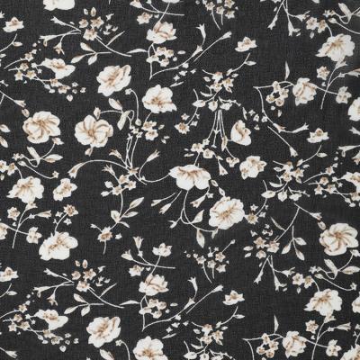 China Good quality anti-static lightweight black and white flowers printed polyester chiffon fabric for sale