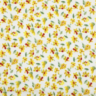 China Simple beauty lot pattern ivory stock yellow floral rayon simple fabric for shirt for sale