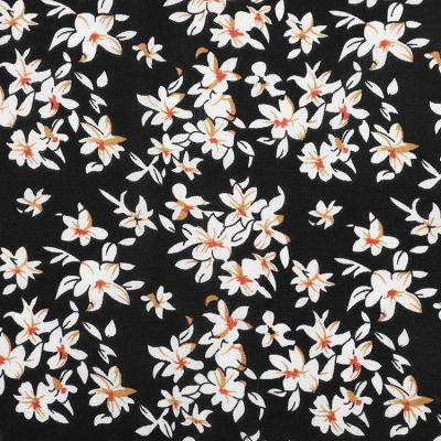 China Newest Techniques Anti-Static Modern Plain Black Rayon Woven Floral Printed Fabric For Skirts for sale