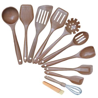 China Viable 11Pcs Custom Logo Set Cooking Tool Kits Anti-split Heat Resistant Handmade Beech Wood Kitchen Utensils for sale