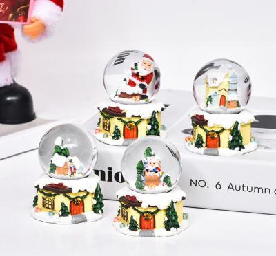 China Europe Christmas Snowball Factory Carousel Snow Globe Golf Ball Snow Globes for sale