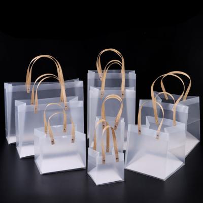 China Low Price Wedding In-Stock Wedding Gift Packing Clear Tier Row Packing PVC PP Handled Waterproof Gift Bags for sale