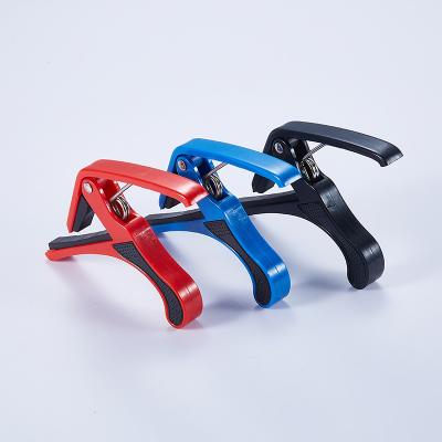 China Folk Big Capo Maker ABS Bakelite Guitar Bend Ukulele Guitar Clip Big Hand Grip Inflection Shift Clip Plastic for sale