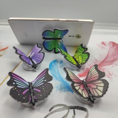 China Free Custom ABS Newest 360 Logo Collapsible Finger Expanding Phone Grip Holder Stand With Butterfly Style for sale