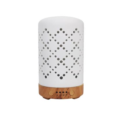 China Household Wooden Grain Base Aromatherapy Oil Diffuser Ceramic Housing Electric Ultrasonic Cool Diffuser for sale