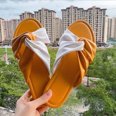 China 2021 fashion trend new women's outdoor beach slippers plus size female sandals stitching cross sandals and slippers for sale