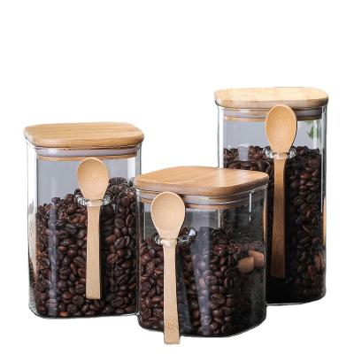 China Sustainable Kitchen Food Spice Storage Container With Bamboo Lid Glass Spice Bottles With Spoon Empty Spice Jars Set Wholesale for sale